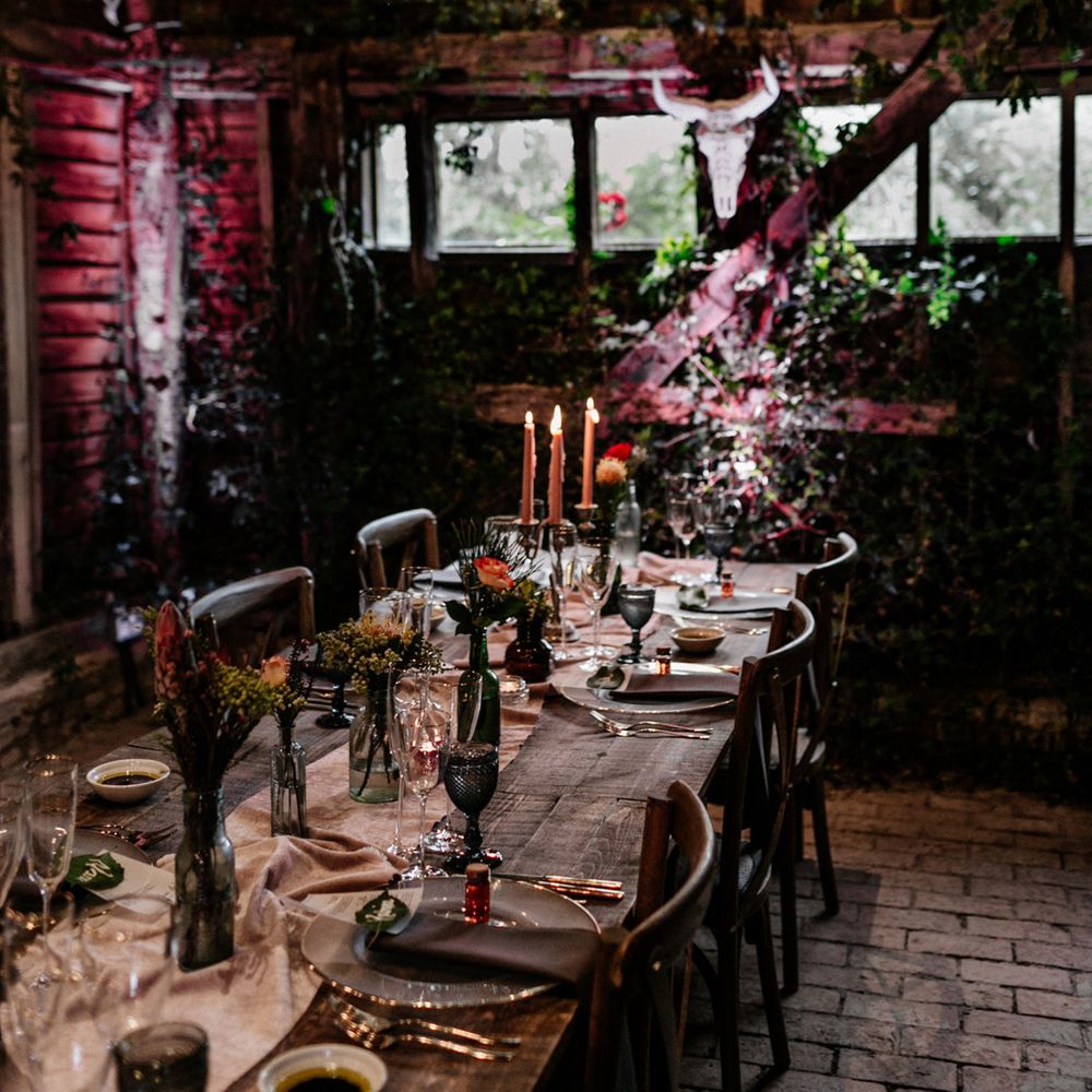 Intimate barn wedding reception with festoon lights at High Billinghurst Farm