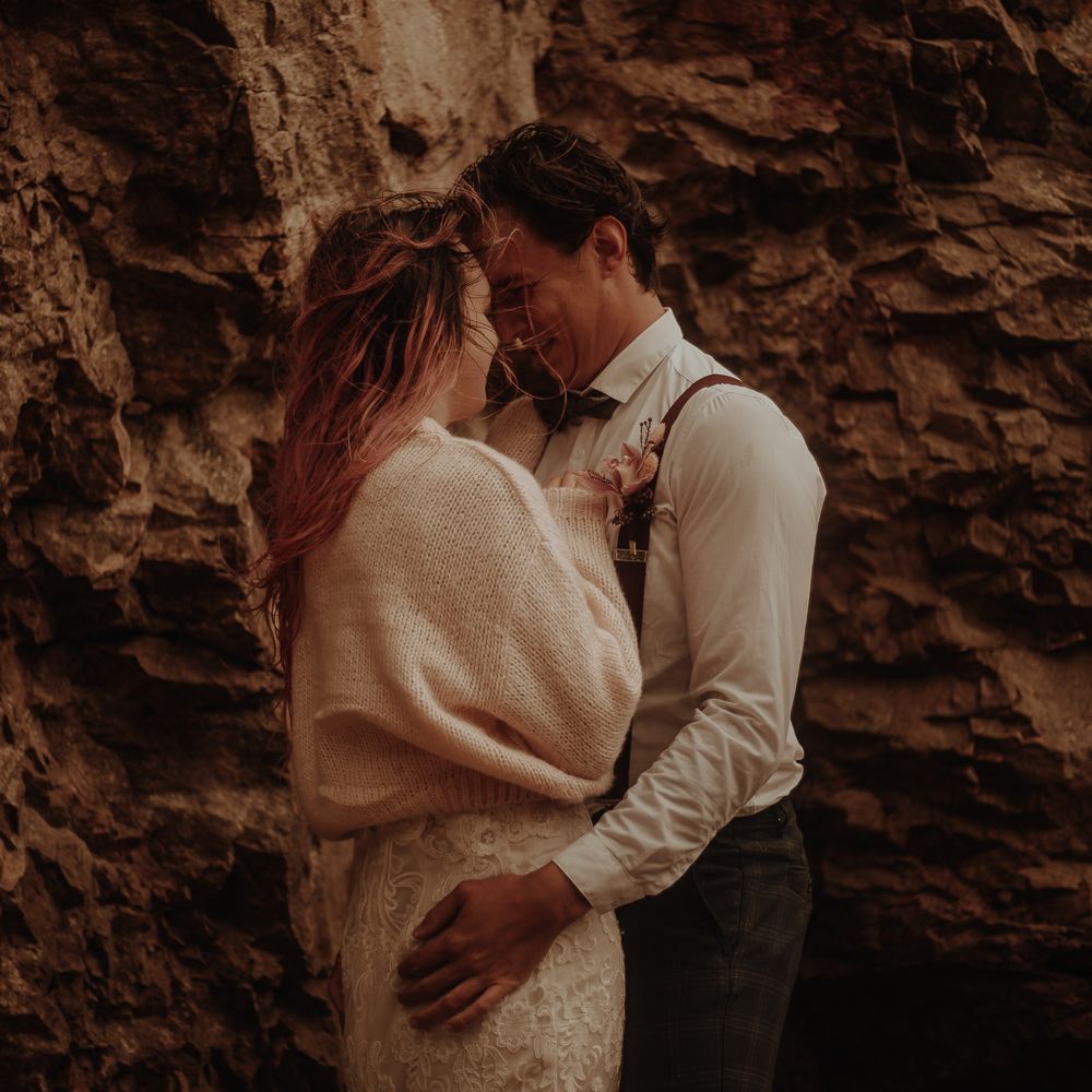 Bride in wooden cardigan at intimate elopement