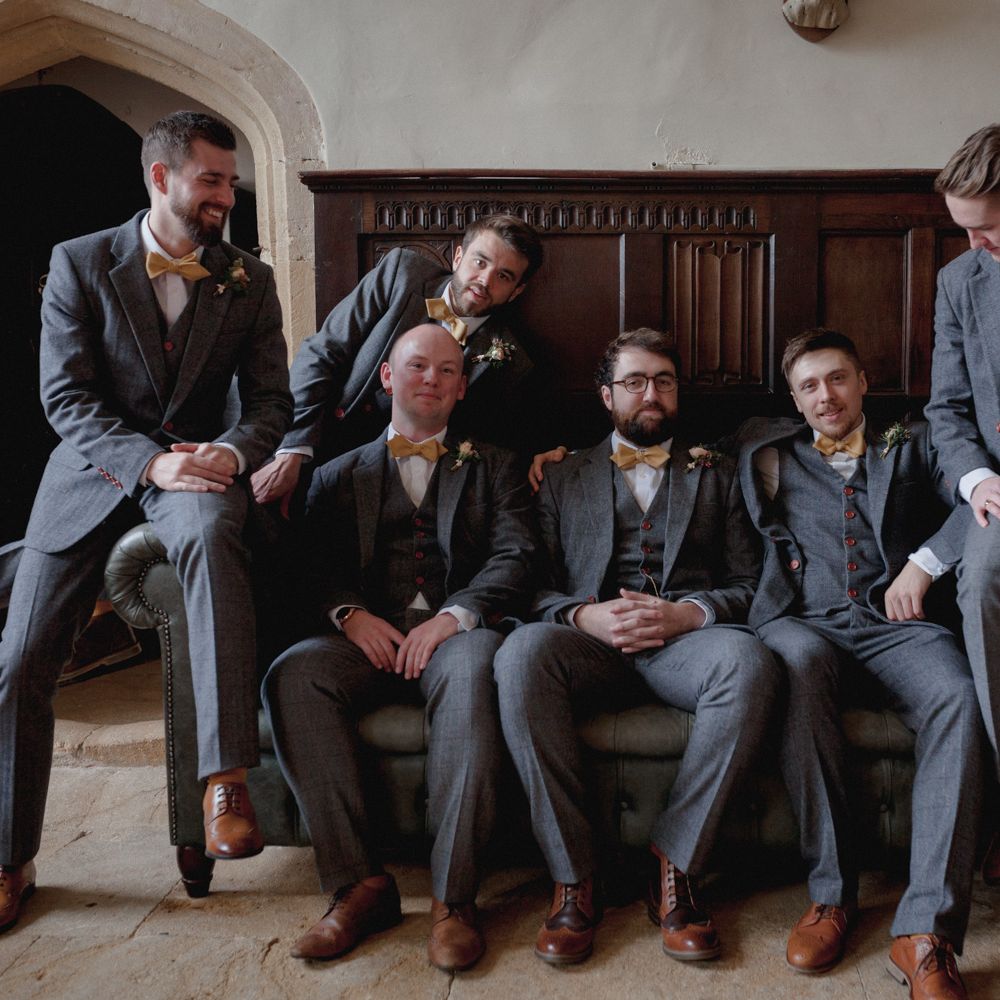 Groomsmen on the morning of their wedding at Brympton House