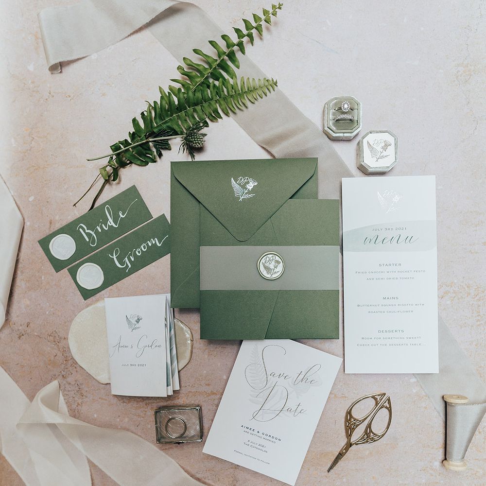 Green and white wedding stationery suite with thistle and leaf design 
