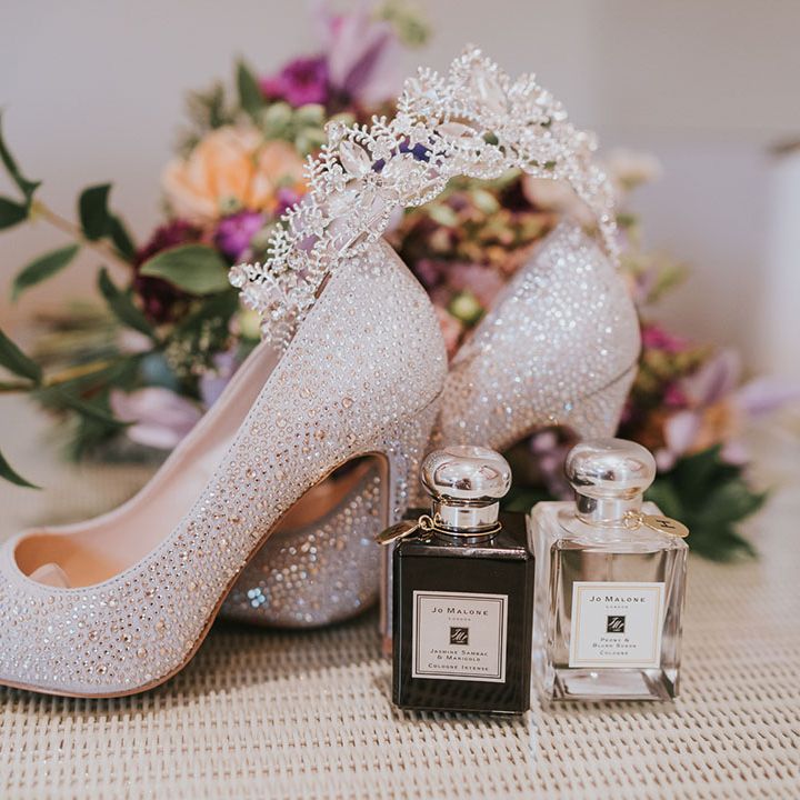Bride's Jo Malone perfume and sparkly diamanté wedding shoes with silver jewelled tiara