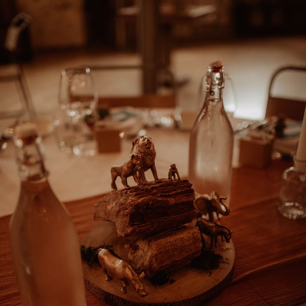 Rustic The Lion King Disney themed wedding centrepiece table decor