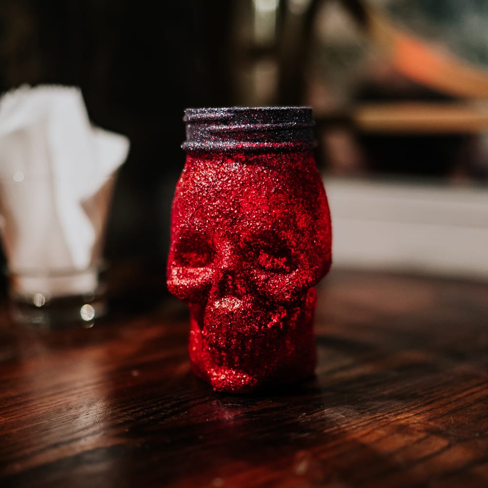 Homemade glitter skull jaw wedding favours 