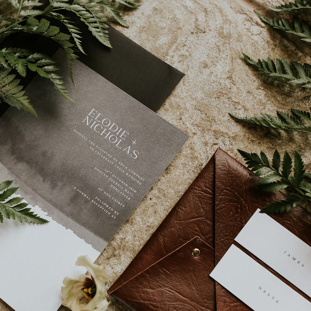modern white and grey wedding stationery design 