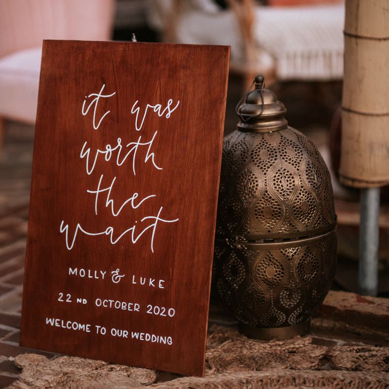 Painted signage reading: It was worth the wait