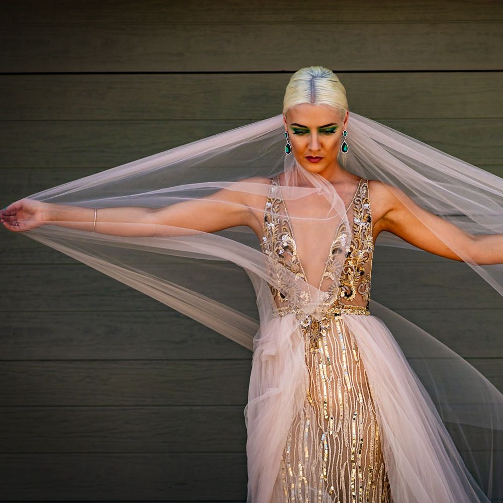 Bride in stunning embellished wedding dress
