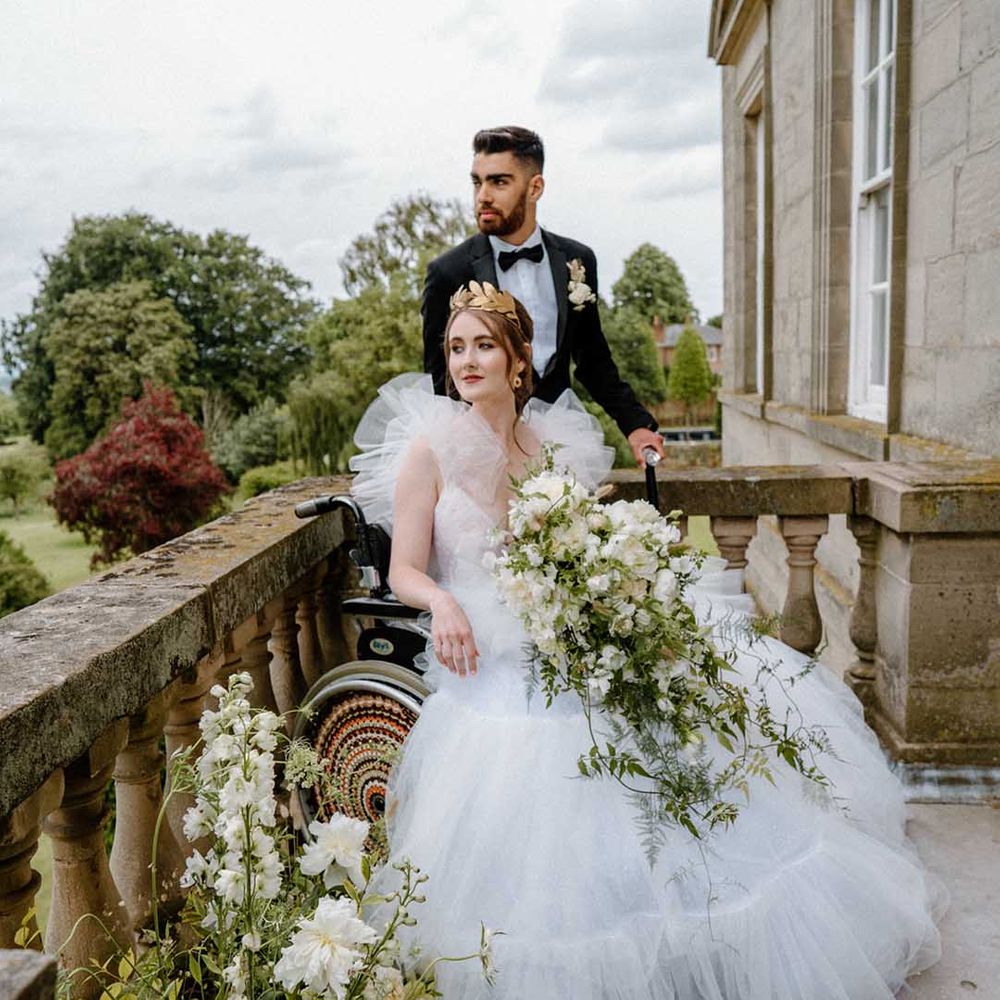 Disabled and interabled wedding inclusion revolution inspiration at Bourton Hall with bride in a tulle wedding dress and groom in a tuxedo 