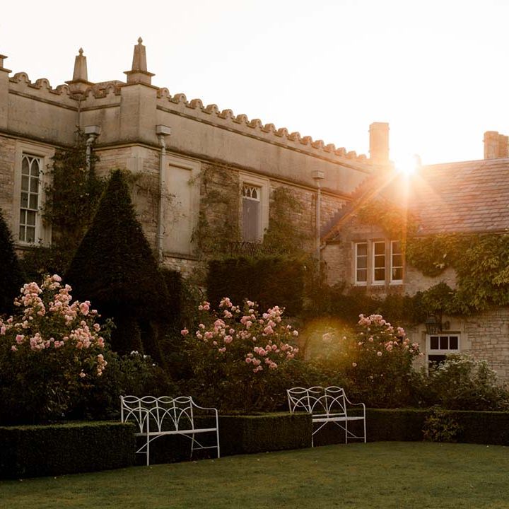 Sun setting over Euridge Manor on wedding day