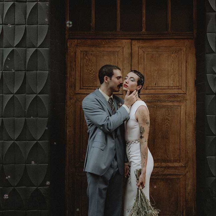 Gabriel in powder blue Gucci suit kisses Lisa in pre loved wedding dress 
