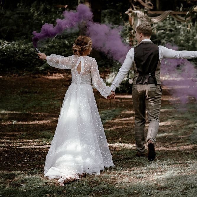 Purple smoke bombs at Sherwood Glade woodland wedding