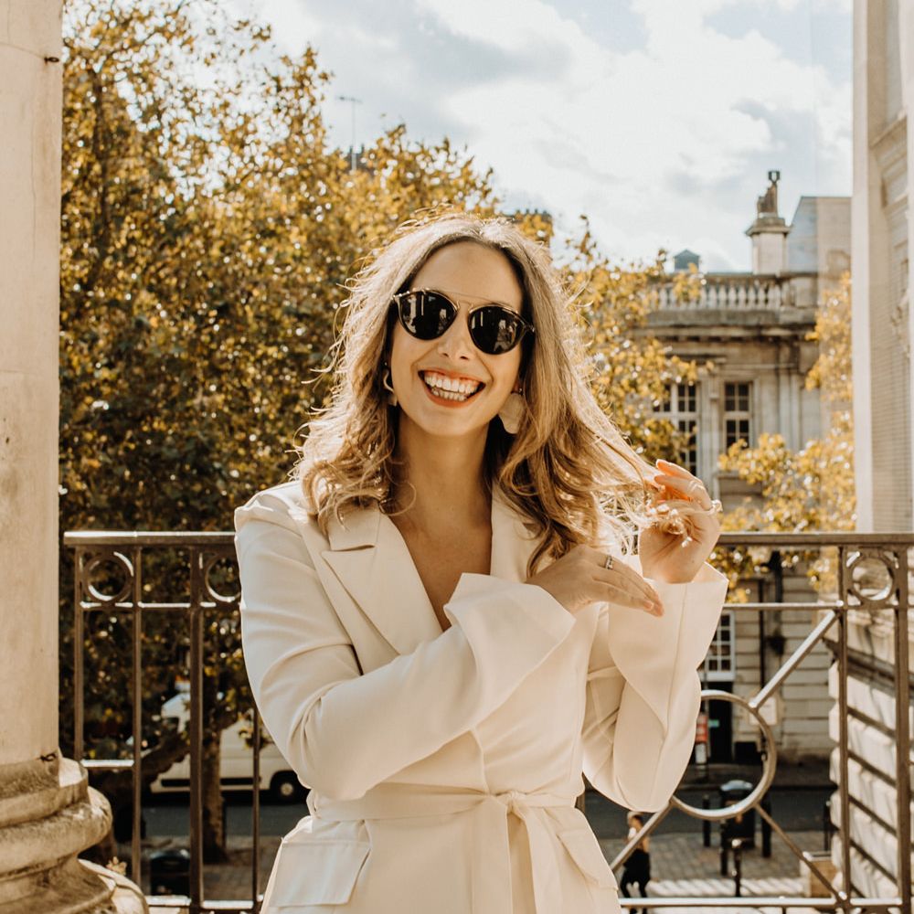 Stylish bride in ivory trouser suit from Topshop for city elopement 