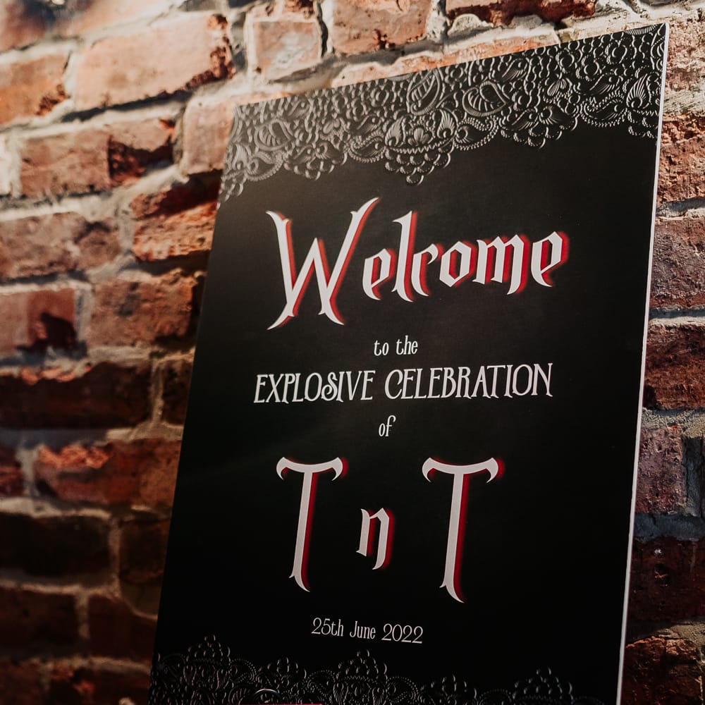Gothic styled 'Welcome' wedding signage complete with TNT box 
