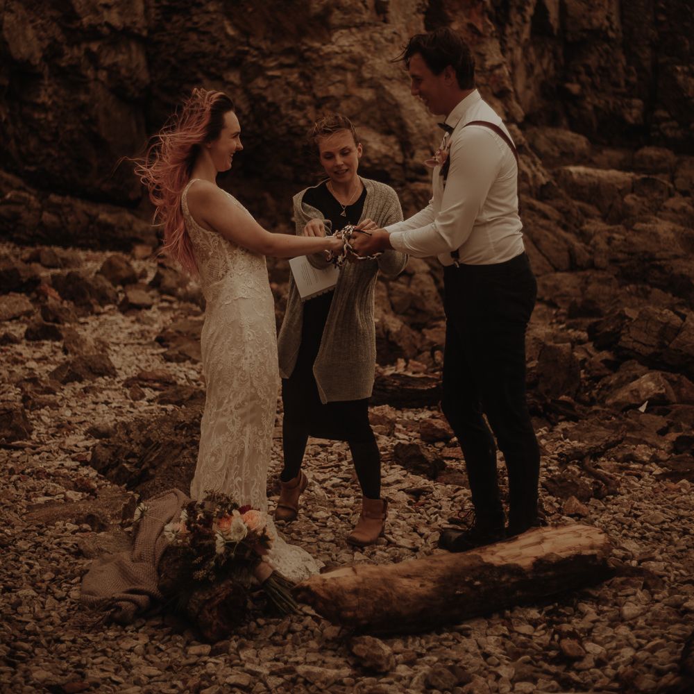 Windy elopement with hand fastening ceremony
