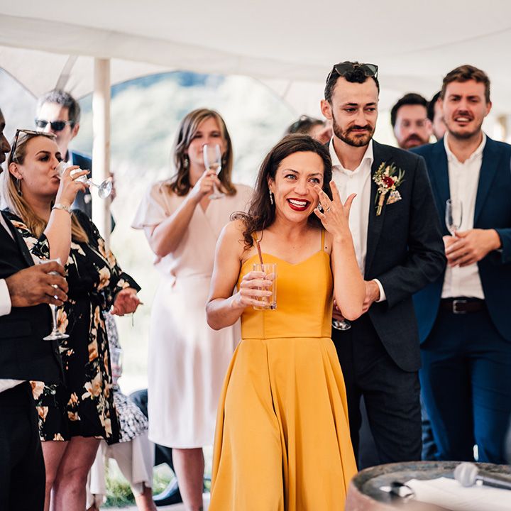 Bride & groom with wedding guests during reception
