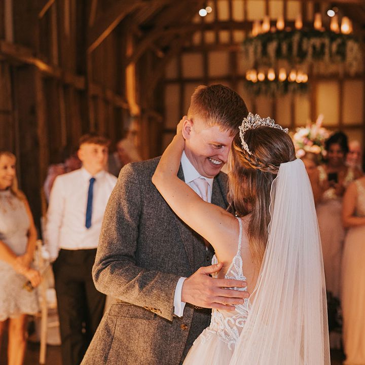 Bride and groom share first dance together