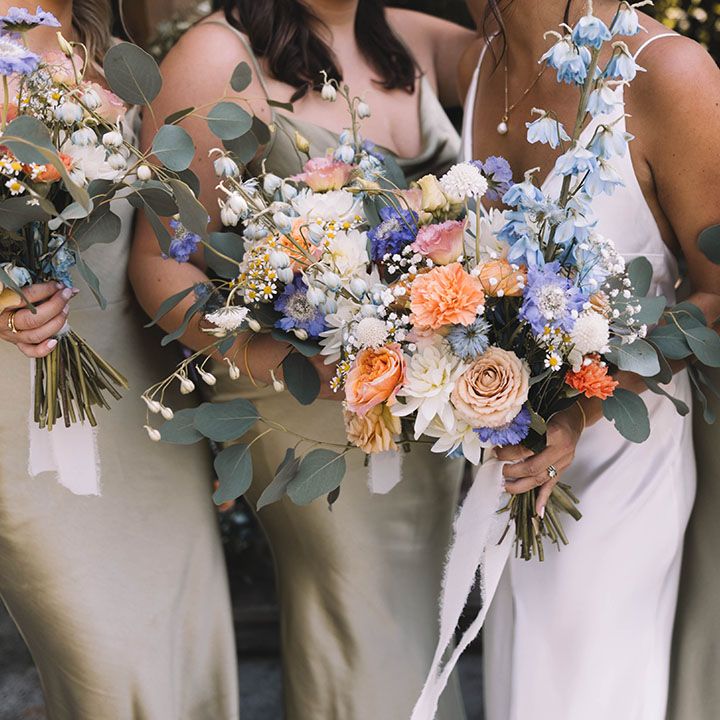 Purple and orange pastel wedding bouquets for summer wedding in Yorkshire 