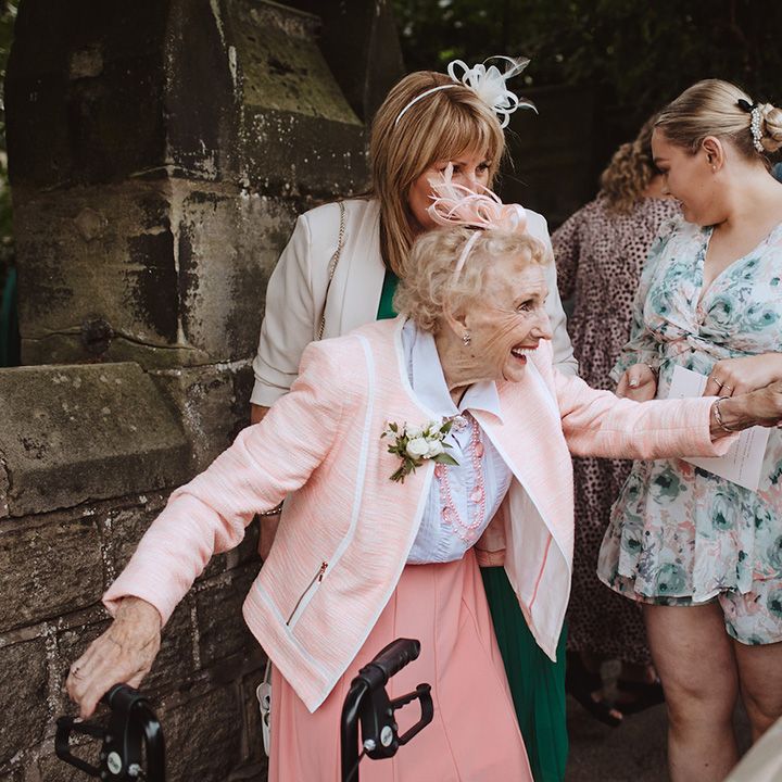 Wedding guest in blush pink theme wedding outfit to match the wedding day 