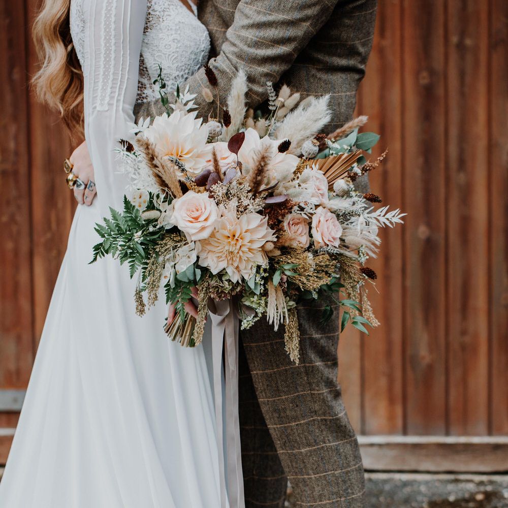 Bridal bouquet with blush pink roses and pampas grass 