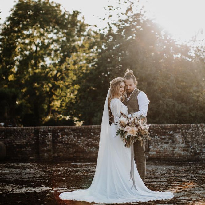 Bride and groom photography with beautiful natural light in country barn garden 