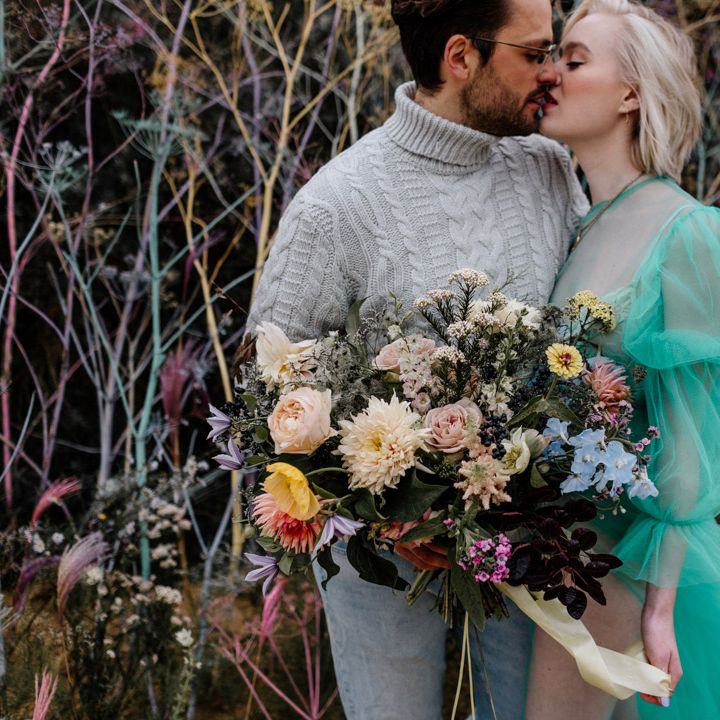Oversized colourful wedding bouquet tied in ribbon 