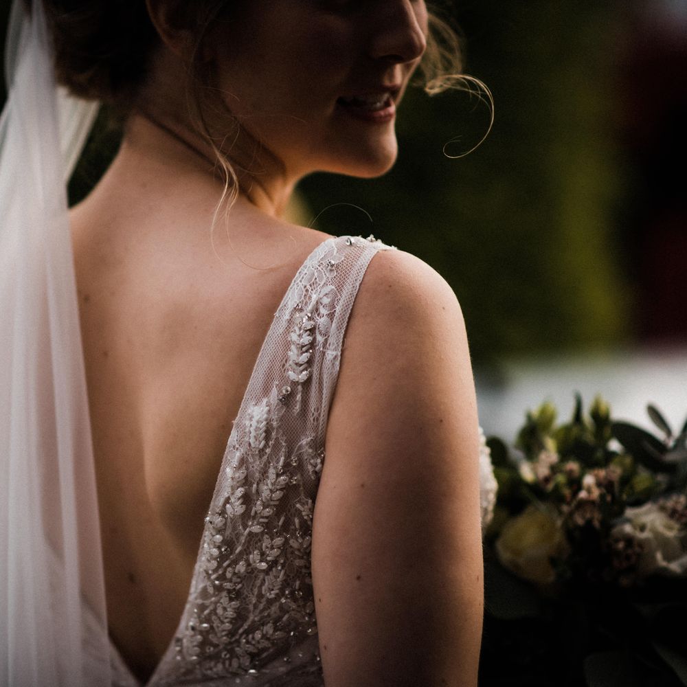 Bride wears Justin Alexander bridal gown