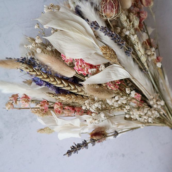 Neutrals, blue and pink dried flowers wedding bouquet