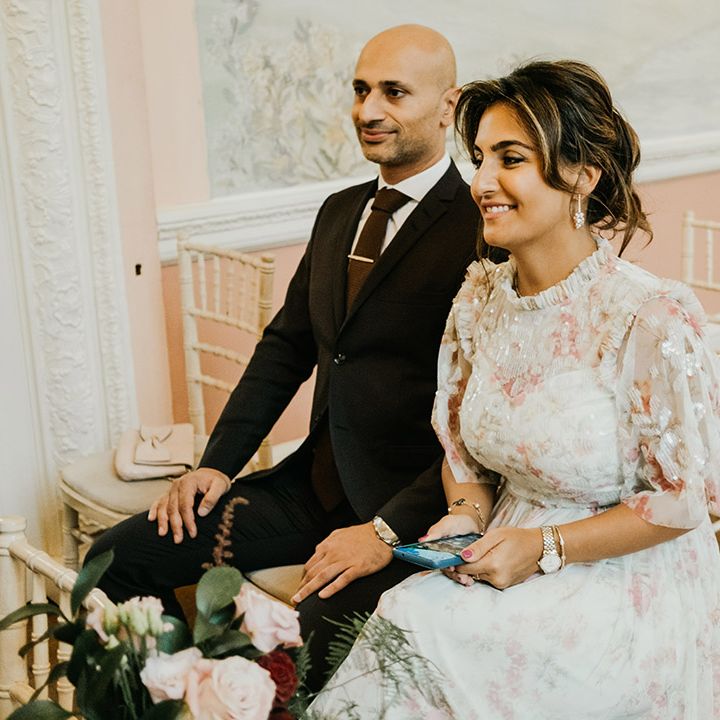 Wedding guest in embroidered dress