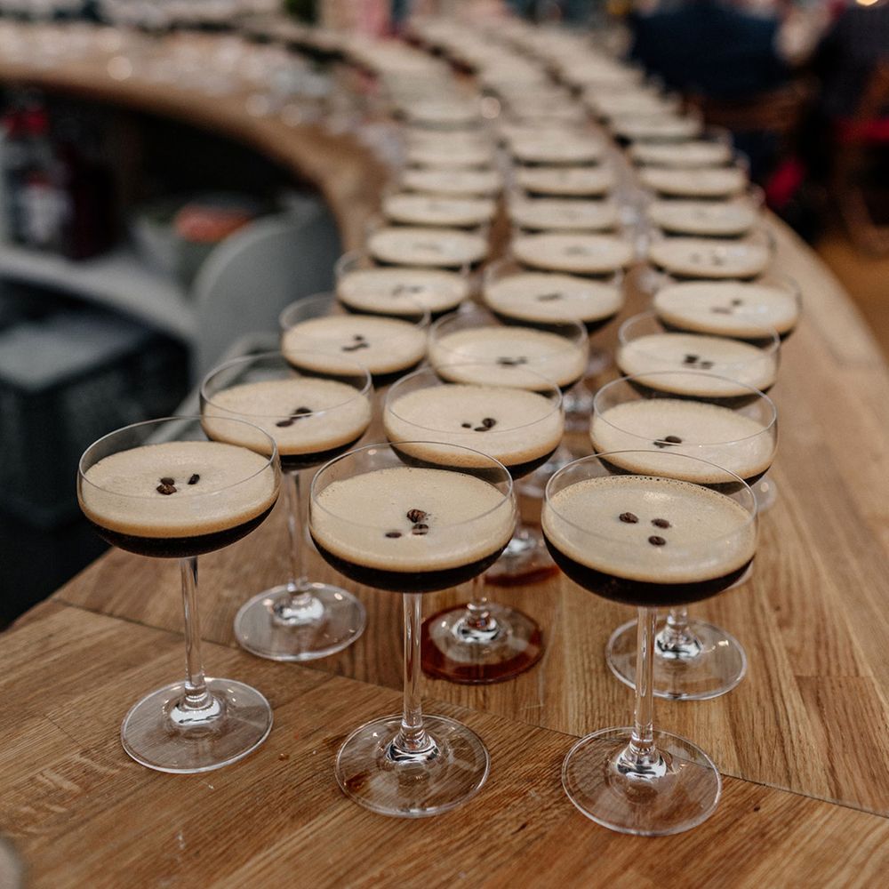 Expresso Martini cocktails lined up on the wedding bar 