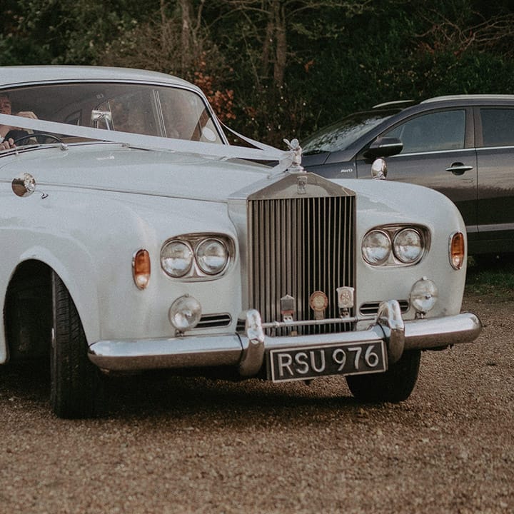 Classic white wedding car at Hedsor House wedding