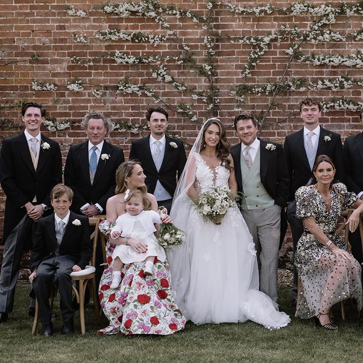 Wedding party shot for outdoor marquee wedding 