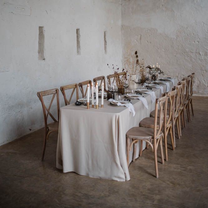 intimate minimalist tablescape with dried flowers 