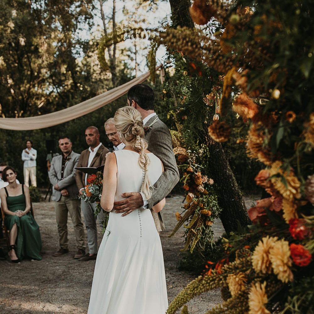 Bride with fishtail wedding hairstyle 