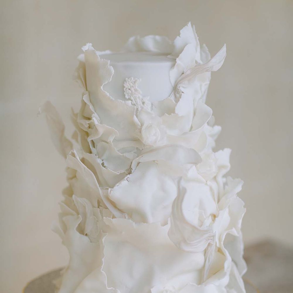 Beautiful white cake complete with art deco styled icing 