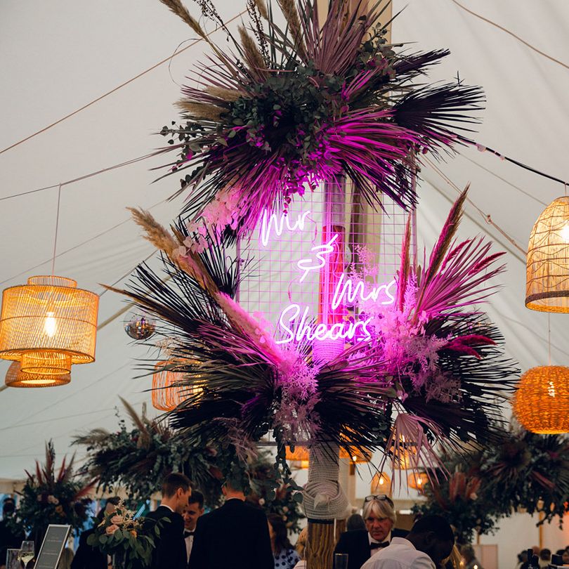 Neon wedding sign, pampas grass decor and hanging lanterns