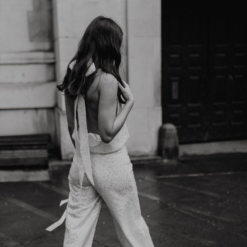 Wide leg sequin trousers and halter neck top for stylish city bride 