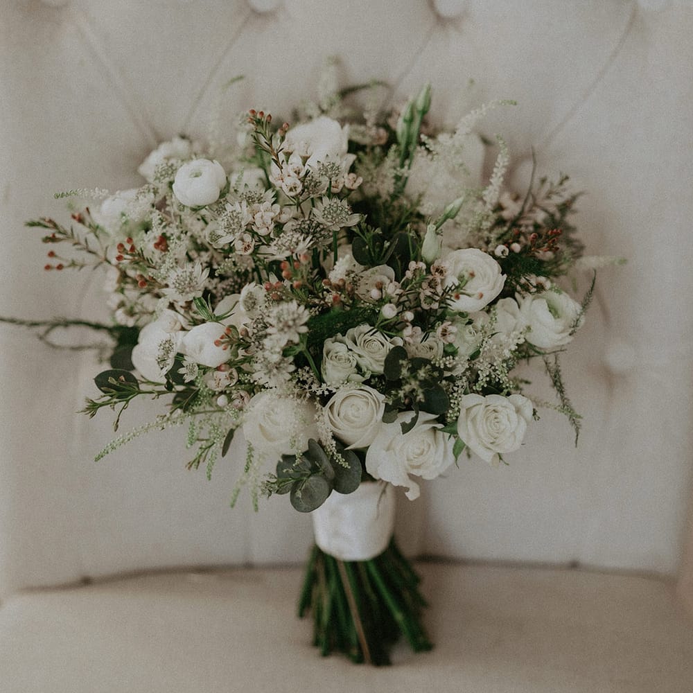 White rose and mixed floral wedding bouquet 