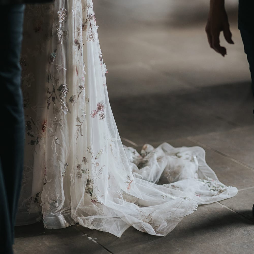 whimsical Savin London Amelia dress with embroidered floral detail 