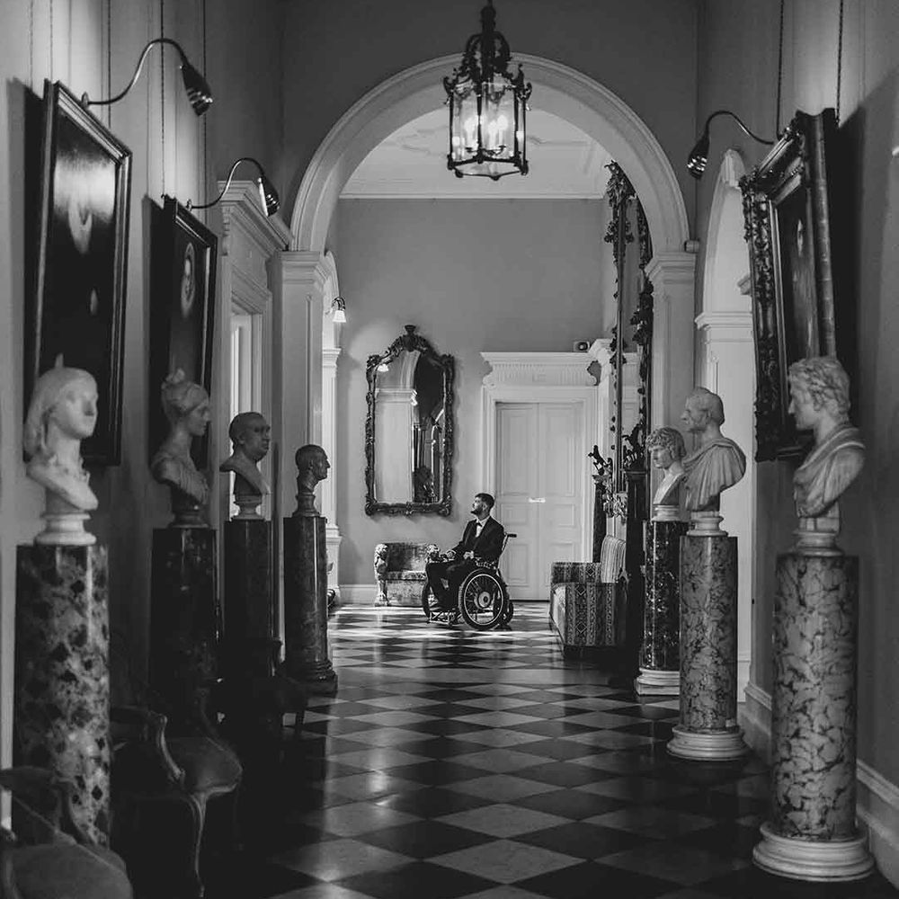 groom in a wheelchair at accessible wedding venue 