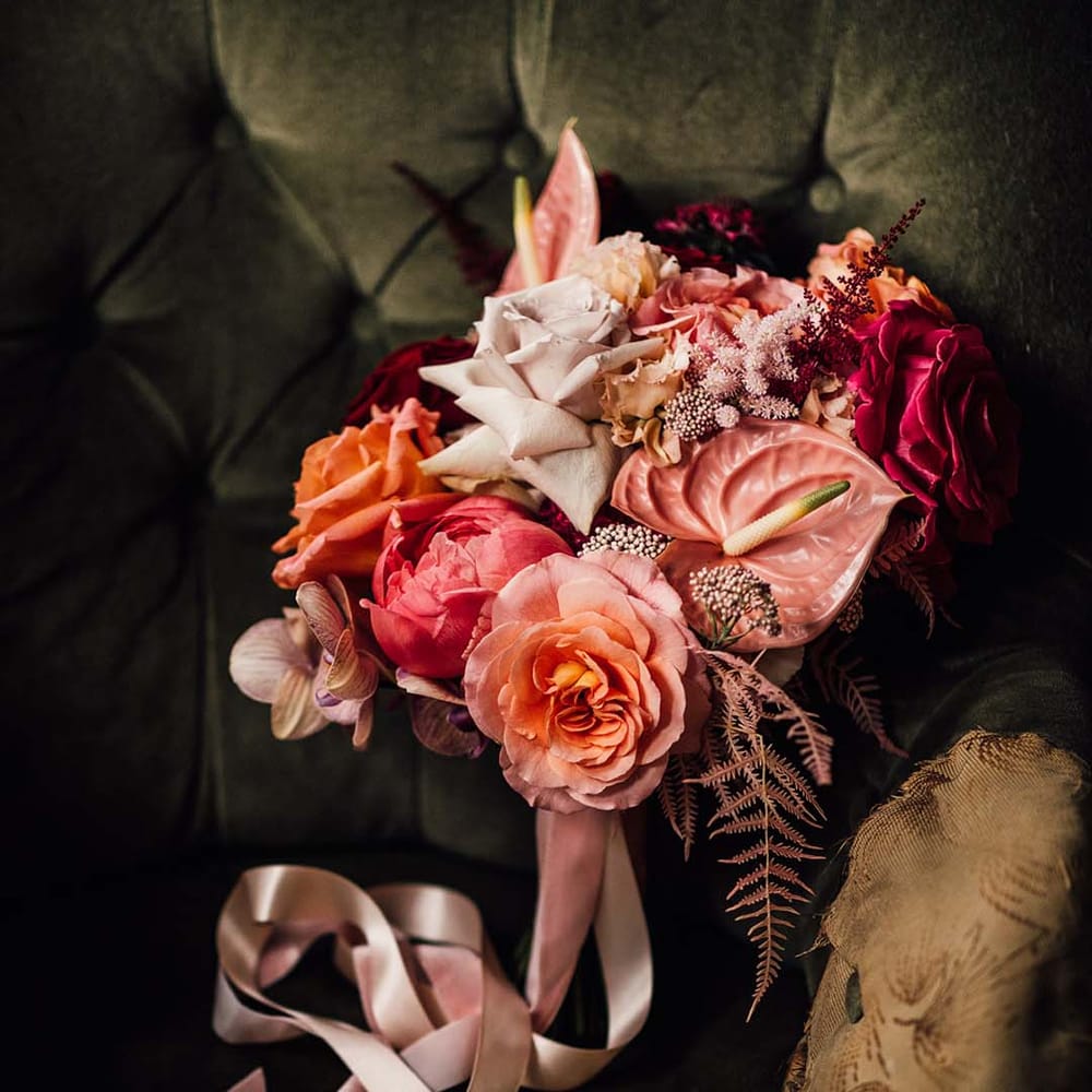 Pink wedding bouquet with orchids and anthuriums for summer wedding 