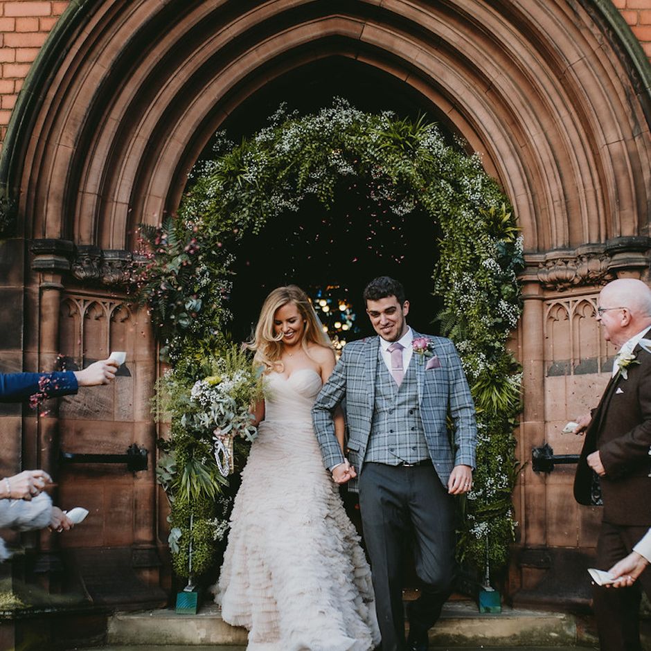 Confetti moment for bride and groom