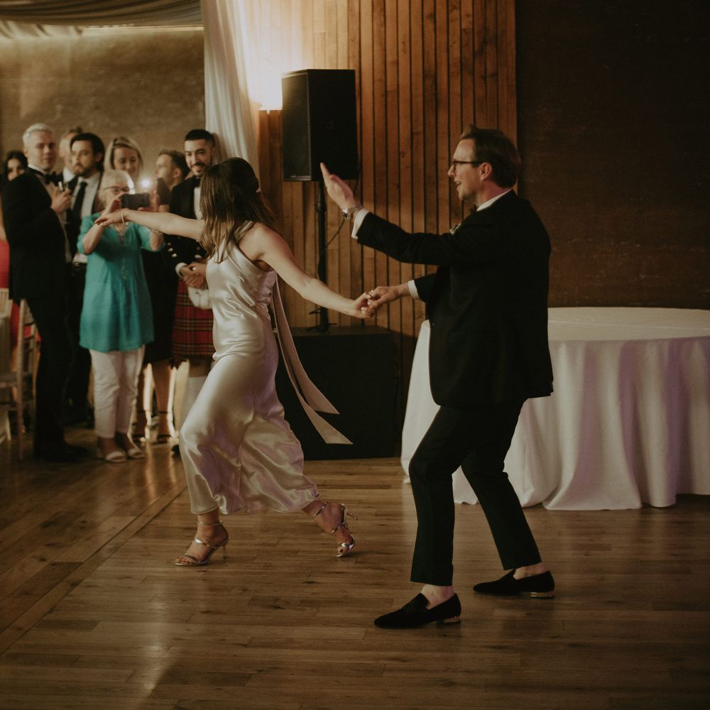 Bride & groom dance on their wedding day during reception