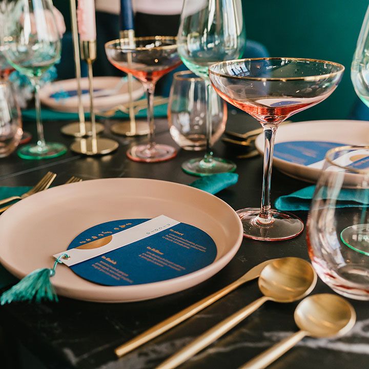 Pink plate with teal and gold foil on the day wedding stationery 