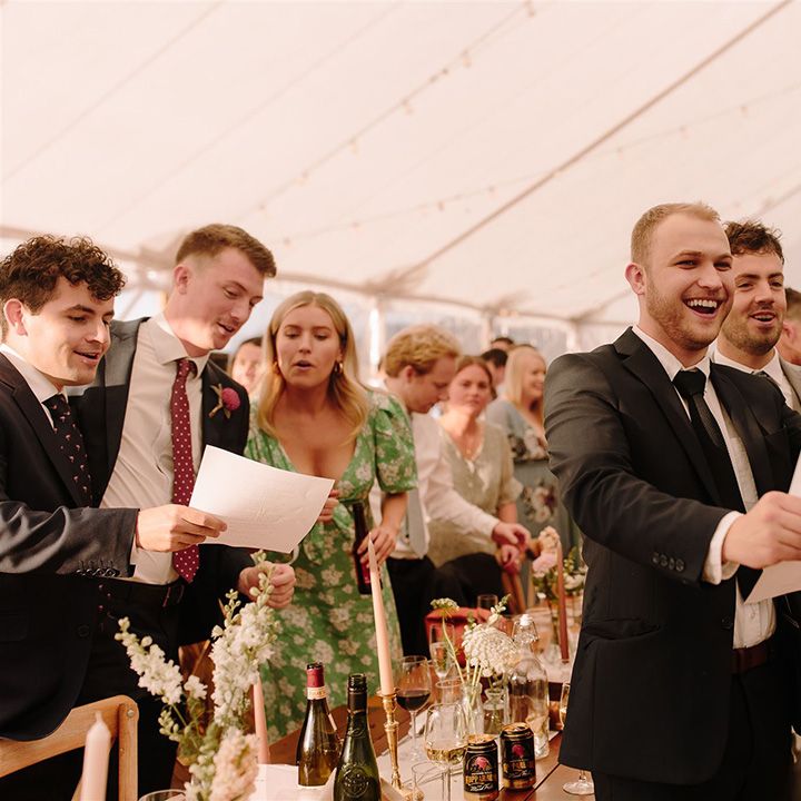 Guests toast the happy couple