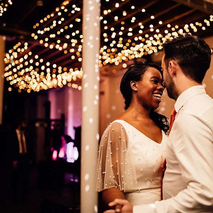 First dance under a canopy of fairy lights at 100 Barrington wedding venue in London 