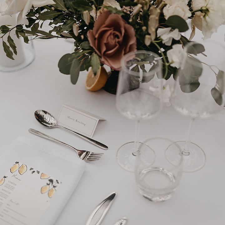 Simple and clean wedding tablescape with DIY stationery and pastel flowers
