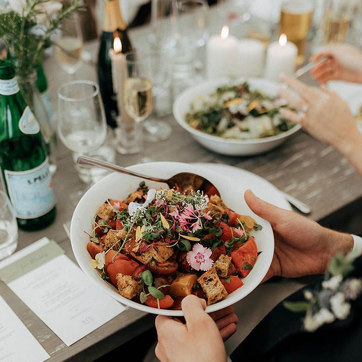 Colourful wedding catering complete with edible flowers