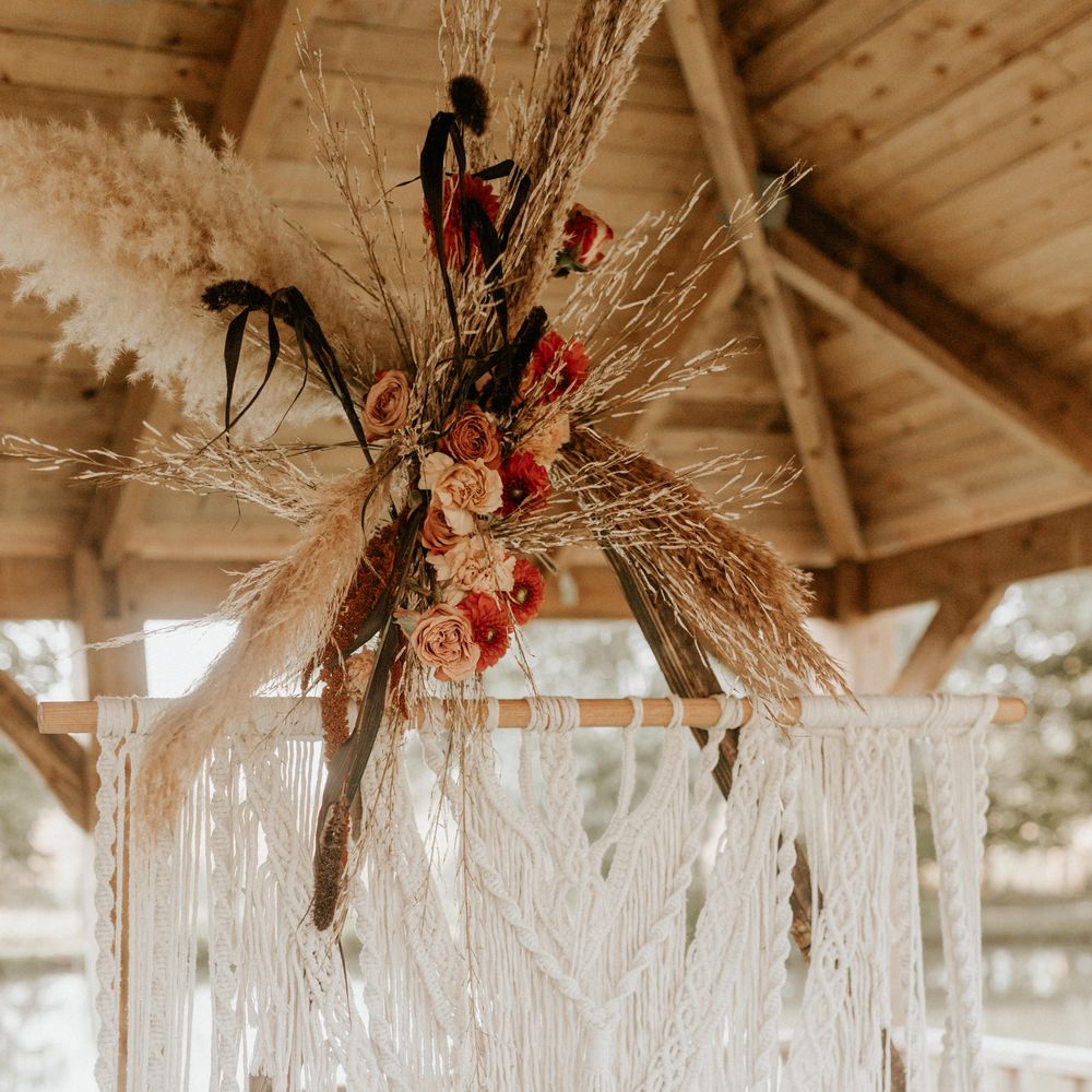 White macrame hanging with floral decoration 