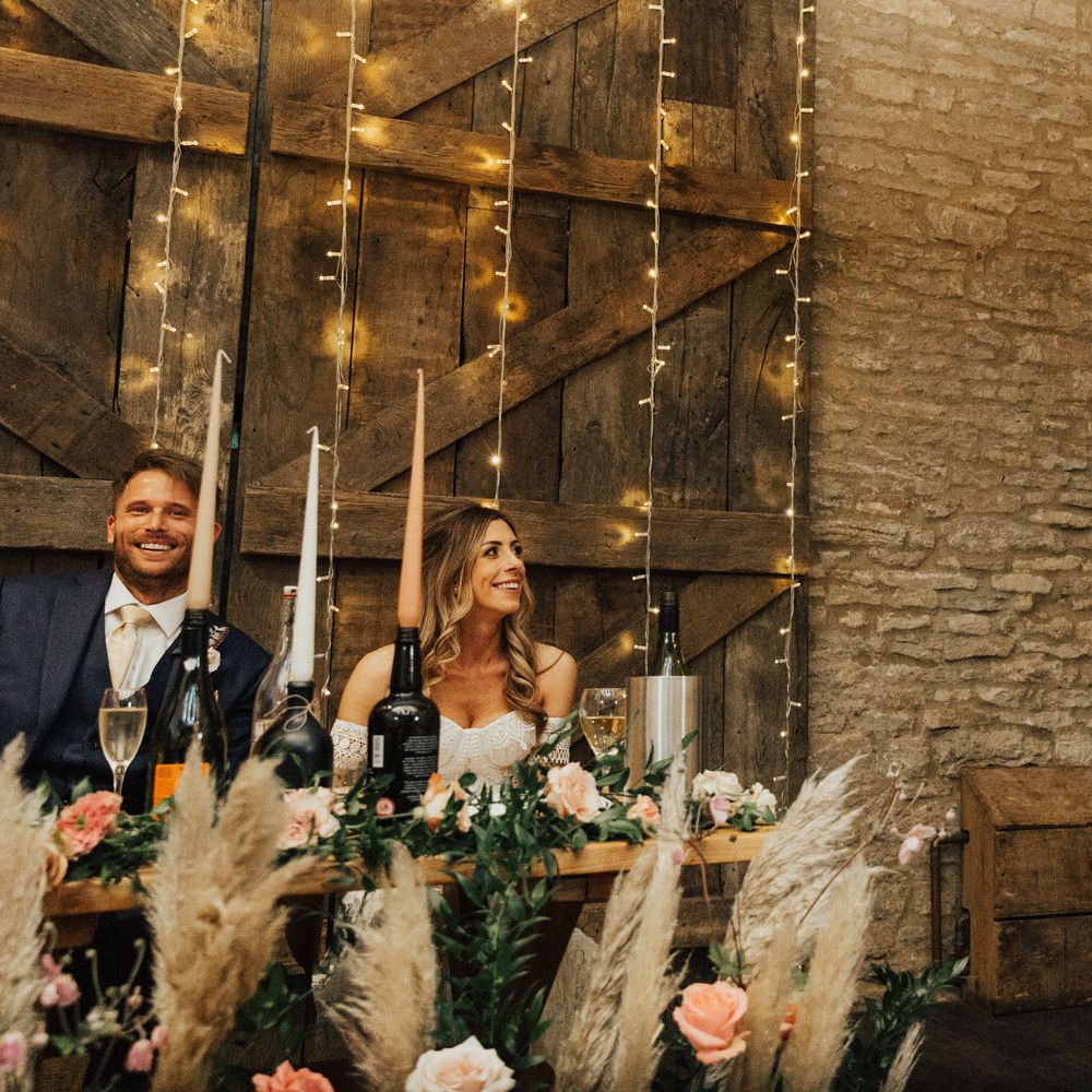 Father of the bride in kilt makes speech at Tythe Barn Wedding with boho decor