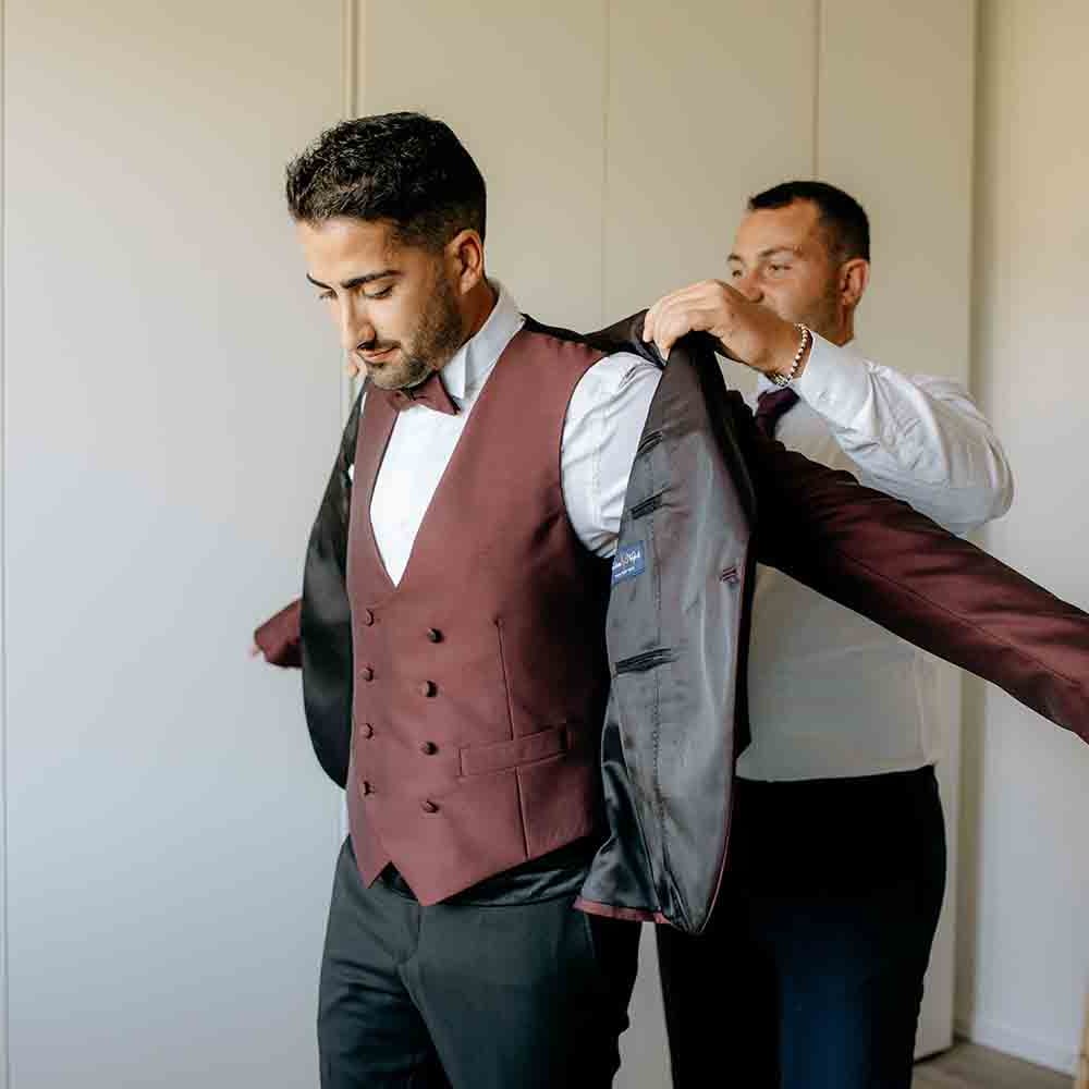 Groom preparations for destination wedding