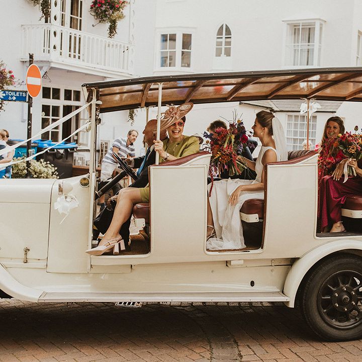 Bridal party arriving in a tuktuk wedding car 